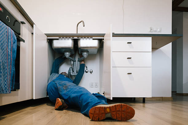 Professional Plumbing technician working in Old Orchard Beach, ME